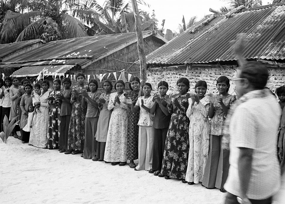 Maldivian women lining up to greet Gayoom visiting their island during the early days of his presidency. Photo: Images of Maldives Past